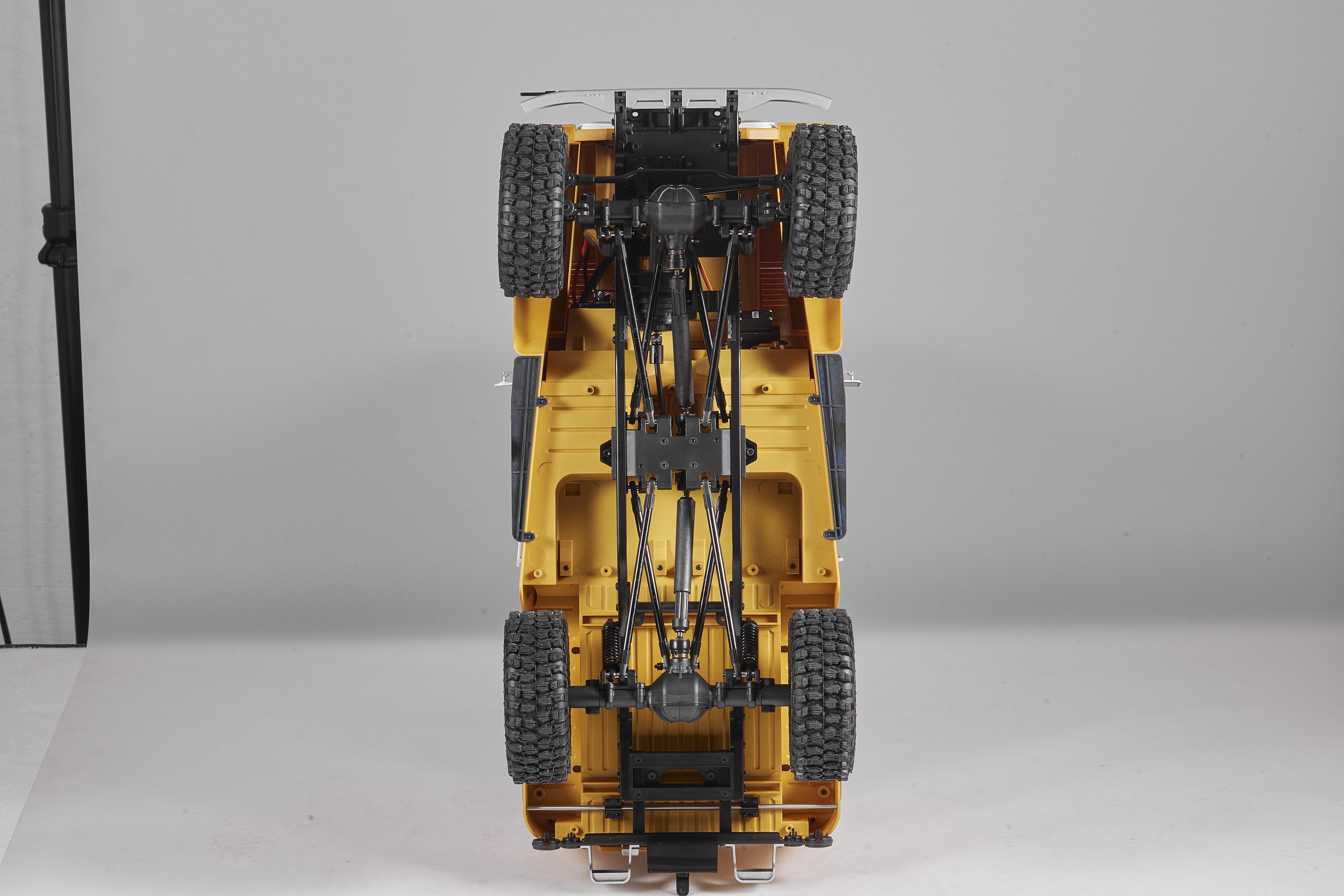 Машинка на радиоуправлении FMS 1:10 Toyota Land Cruiser FJ40 RS Yellow - фото 12 Машинка на радиоуправлении FMS 1:10 Toyota Land Cruiser FJ40 RS Yellow - фото 12