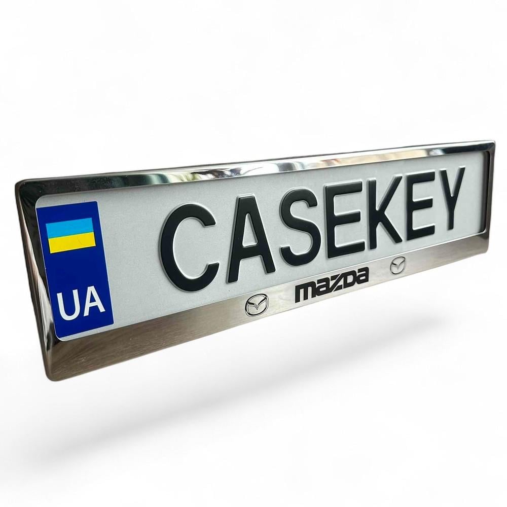 Авторамка метелическая с гравировкой Mazda (maramkaza1)