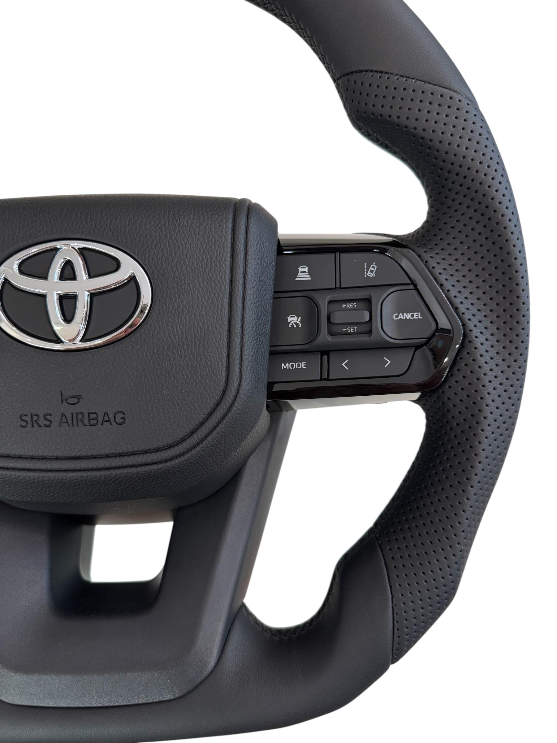 Руль для Toyota Land Cruiser 200 Prado 150 Без подогрева кожа со скошенным низом логотип хром (29342176) - фото 3 Руль для Toyota Land Cruiser 200 Prado 150 Без подогрева кожа со скошенным низом логотип хром (29342176) - фото 3