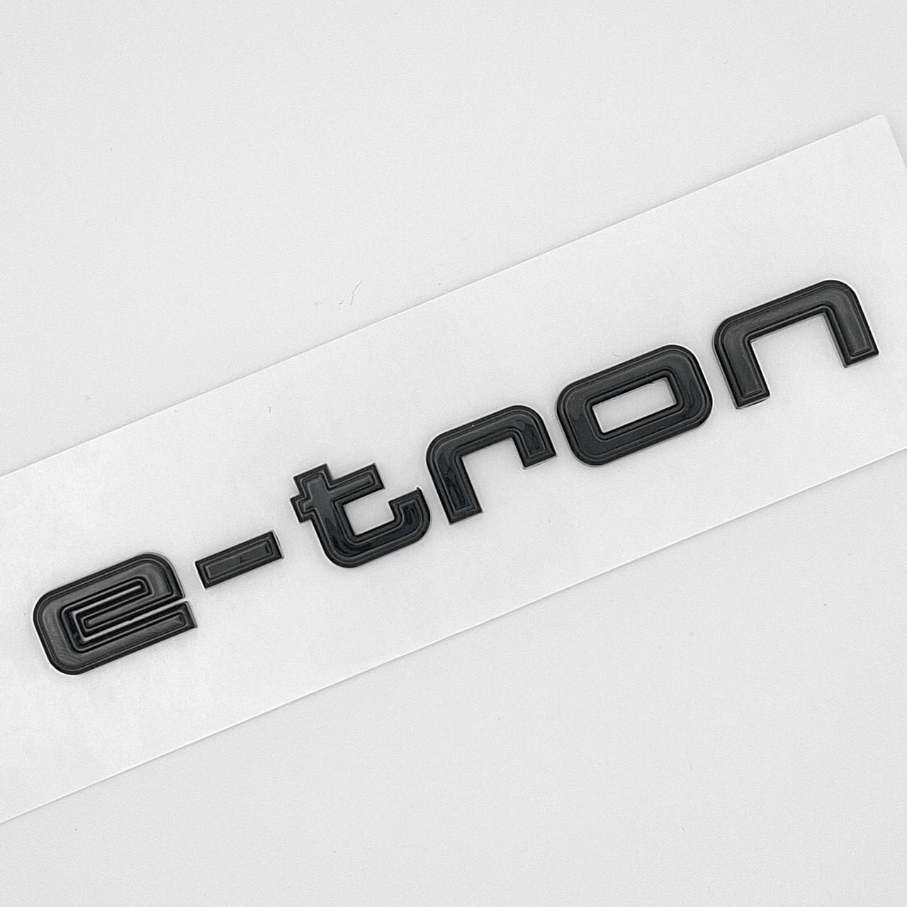 Емблема напис e-tron Audi ABS 11х1,3 см Чорний глянцевий (2808809250)