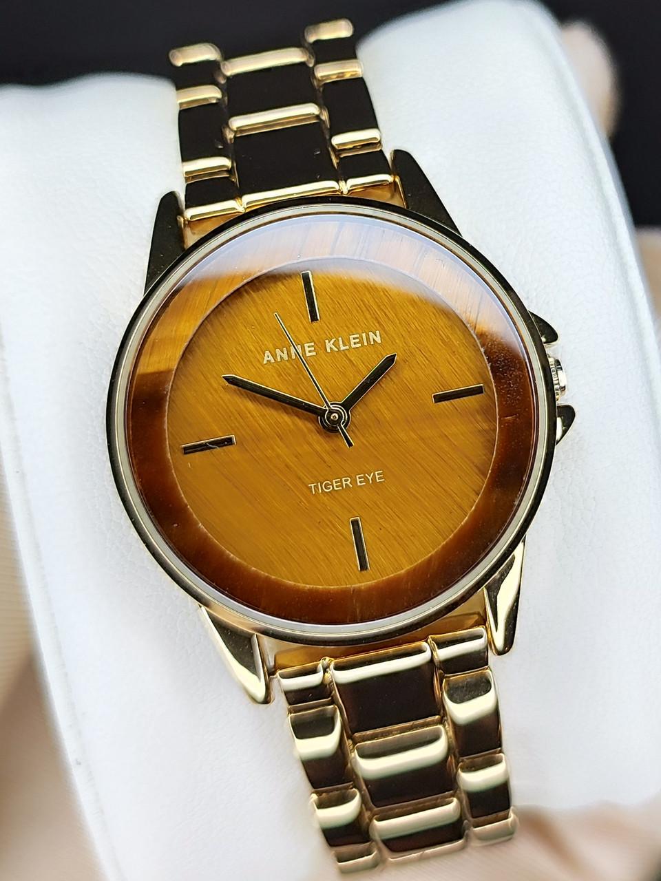 Наручные часы женские Anne Klein AK/4132TEGB с золотистым циферблатом и стальным браслетом