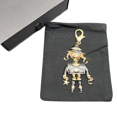 Брелок-подвеска дизайнерский Chanel Кукла в очках Black/Gold