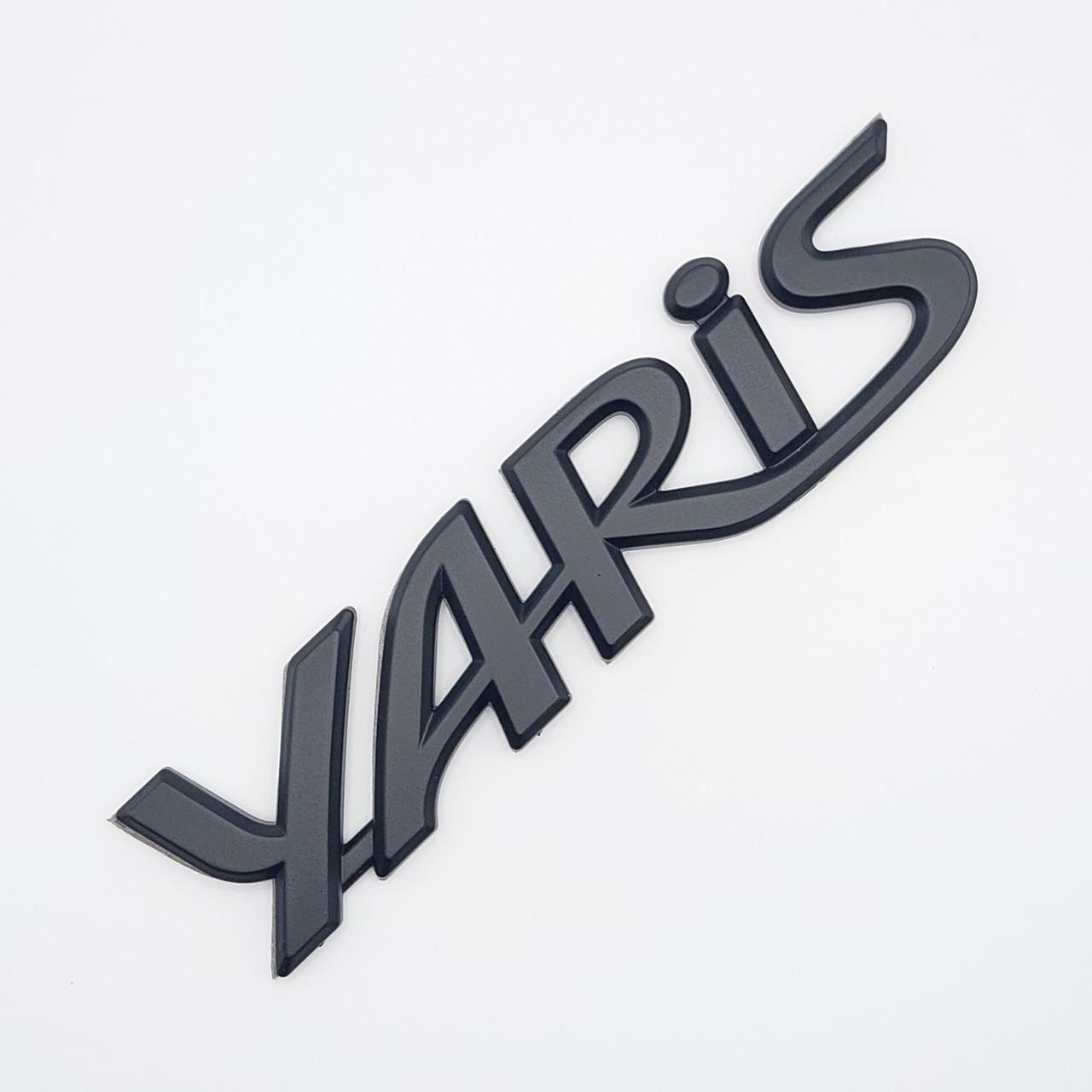 Эмблема надпись Yaris Toyota ABS 13,7х3,5 см Черный матовый (1813914584)