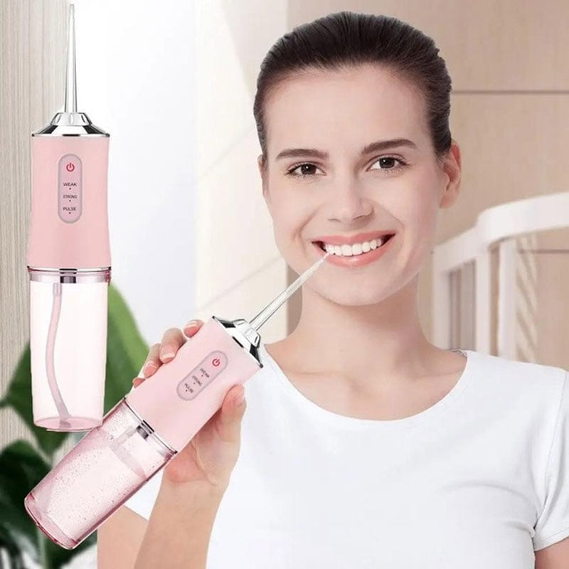 Іригатор Portable Oral Irrigator для зубів та порожнини рота Pink (tf7077) - фото 2 Іригатор Portable Oral Irrigator для зубів та порожнини рота Pink (tf7077) - фото 2