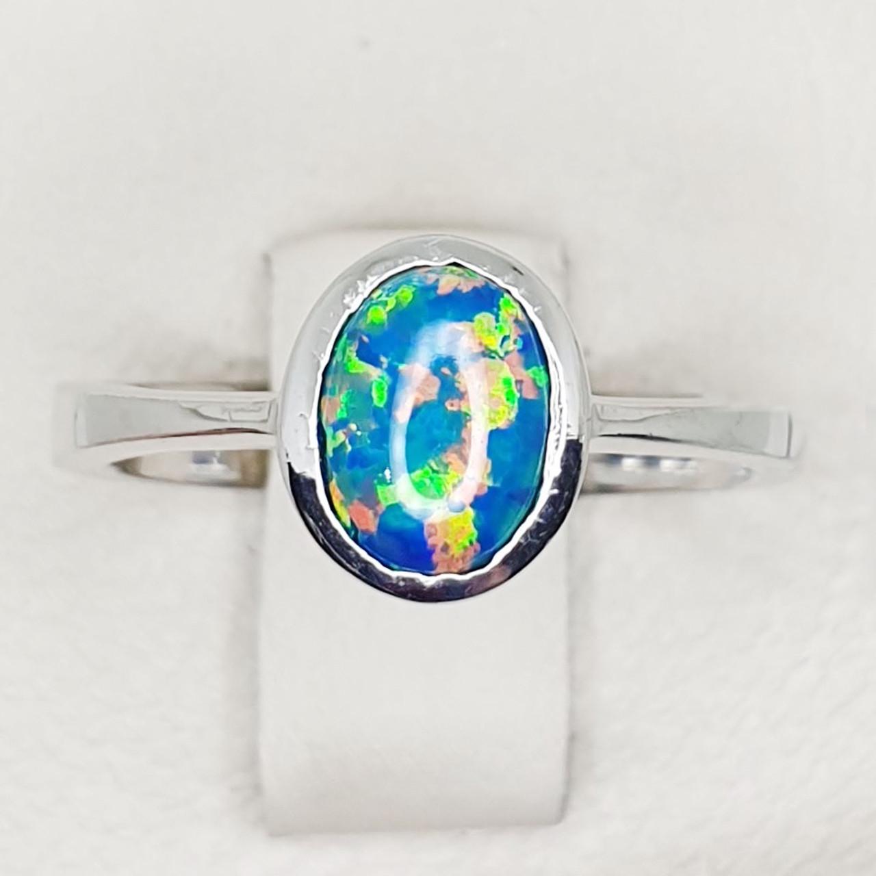 Кольцо серебряное с опалом р. 18,5 3,13 г (1416711402)