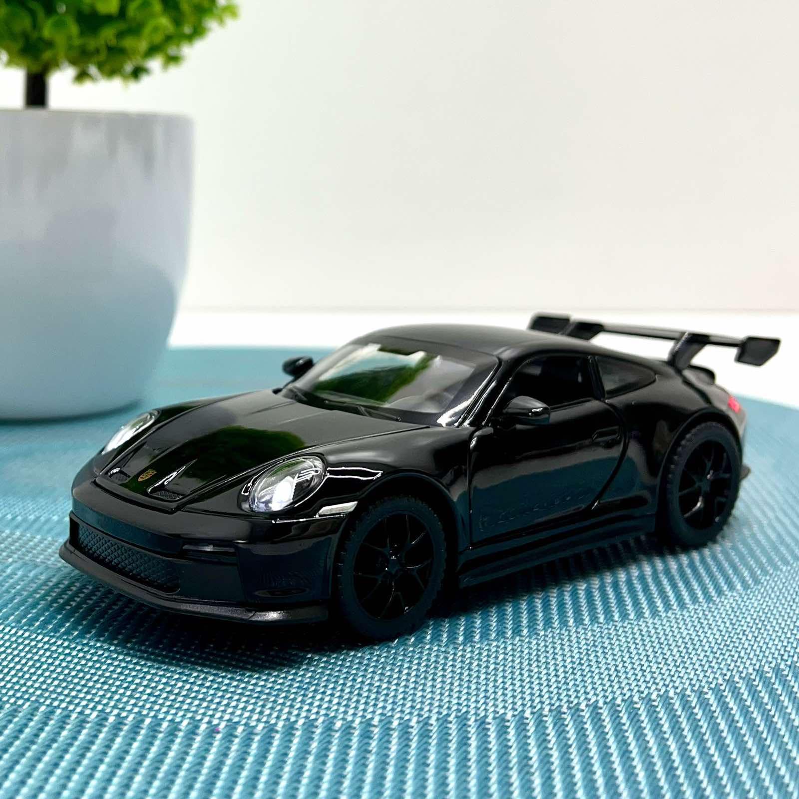 Машинка металлическая АвтоЭксперт Porsche 911 1:32 свет/звук 15 см Черный (14772)