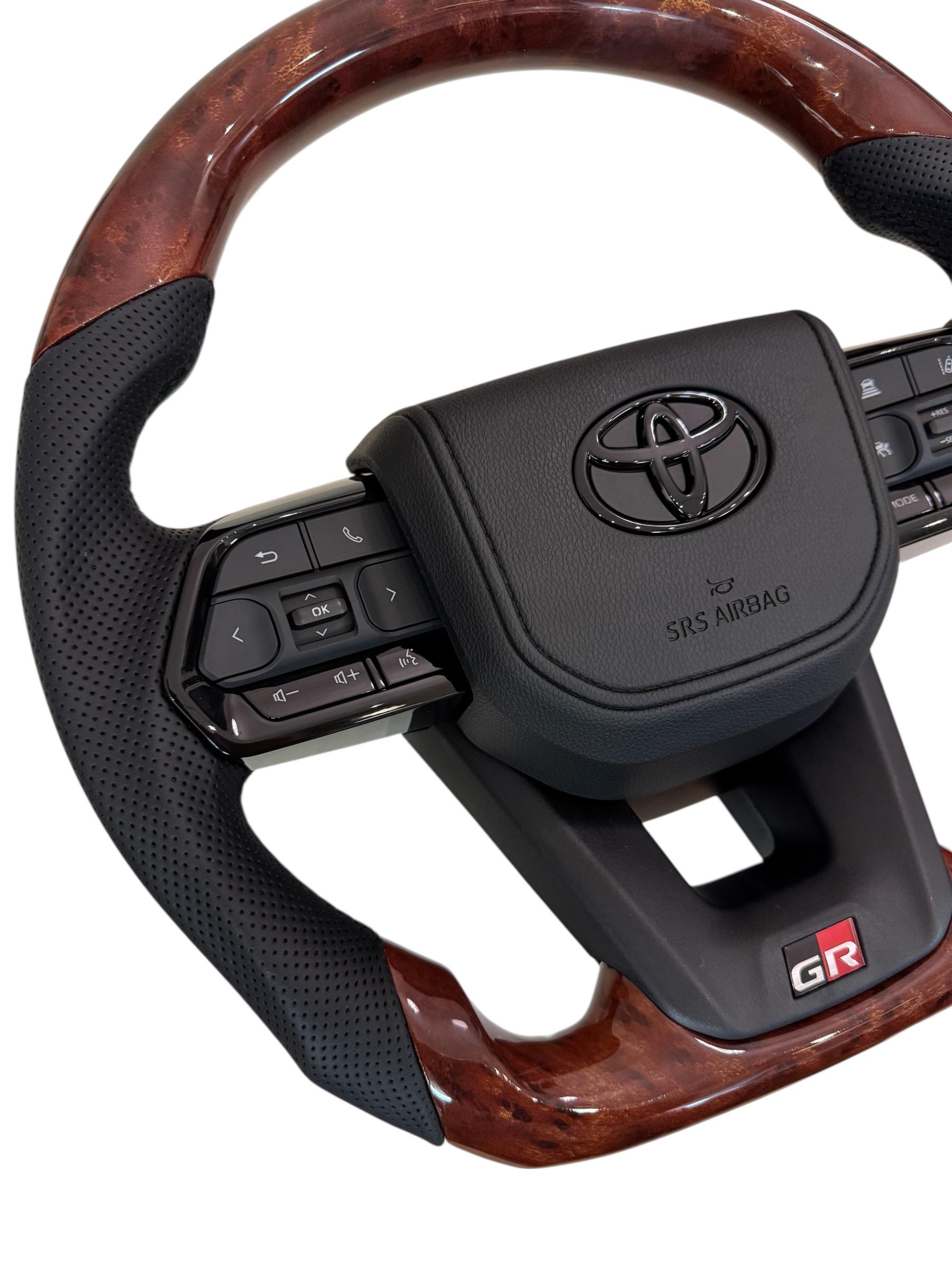 Кермо для Toyota Land Cruiser 100/Prado 120 GR під оригінальний колір салону в сборі зі скошеним низом логотип чорний глянець (30246663) - фото 4