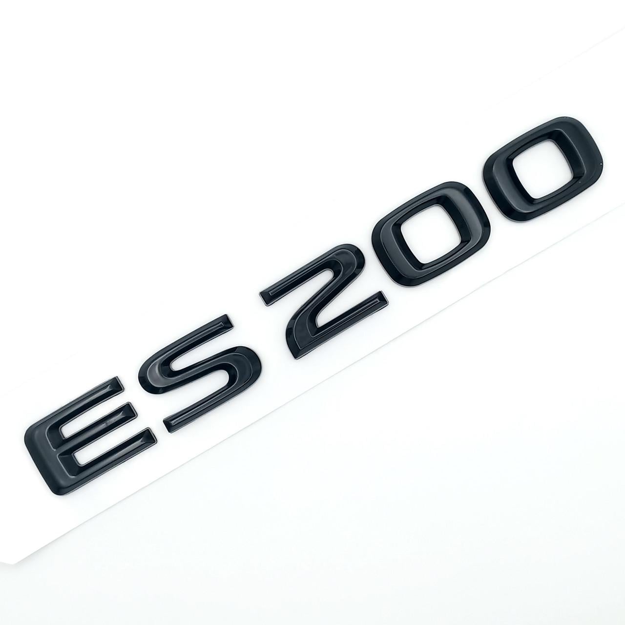 Эмблема надпись ES200 Lexus ABS 16х2 см Черный глянцевый (2702843458)