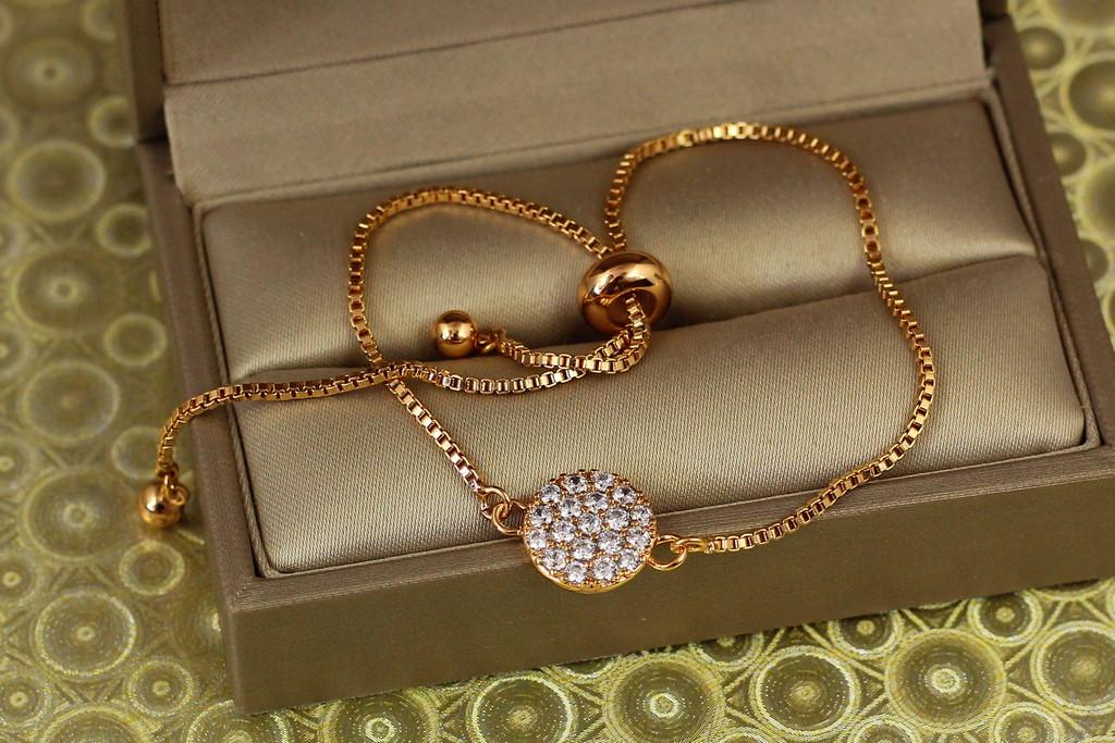 Браслет регулируемый Xuping Jewelry Монетка на бегунку Золотистый (2329241491)