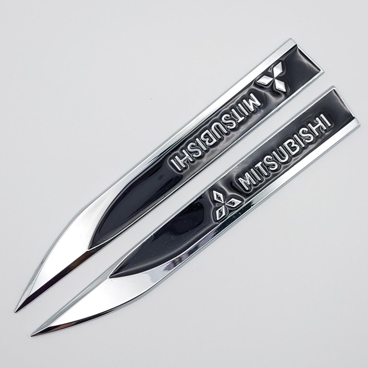Эмблема на крылья Mitsubishi 15х1,8 см Хром/Черный глянцевый (1783501113)