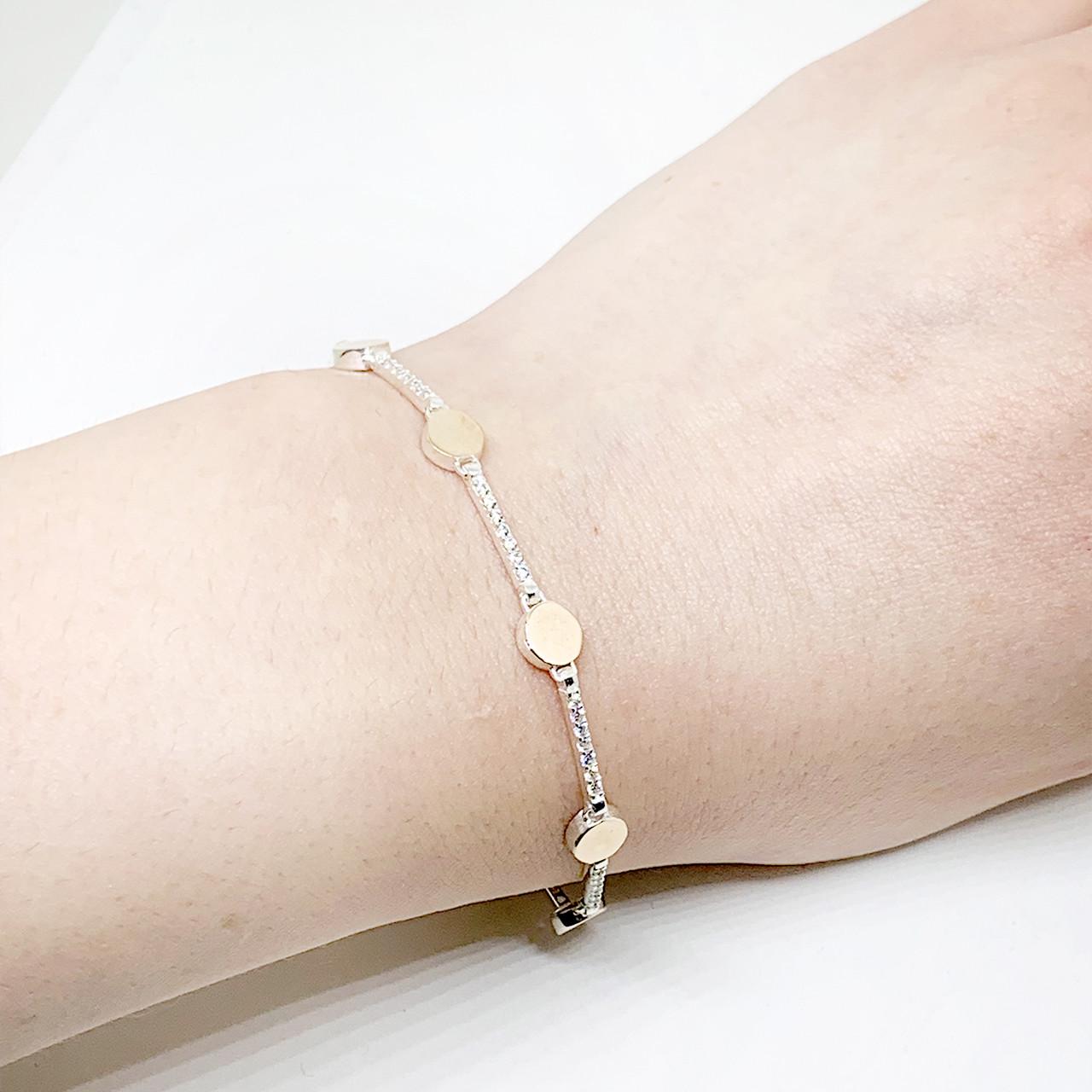 Браслет серебряный с кубическим цирконием и золотыми пластинами р. 18 7 г