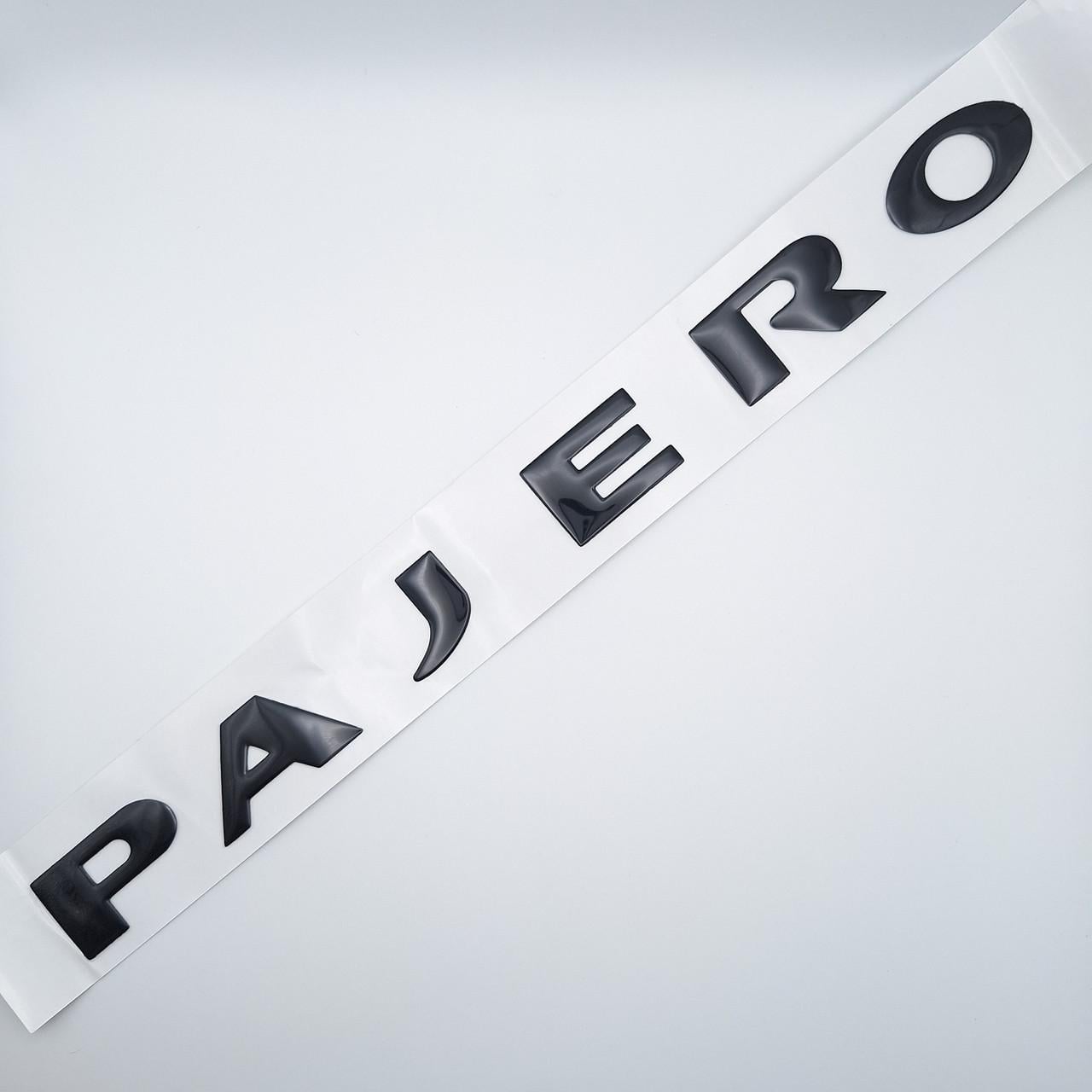 Эмблема надпись Pajero Mitsubishi 31,3х2,5 см Черный глянцевый (2343656138)
