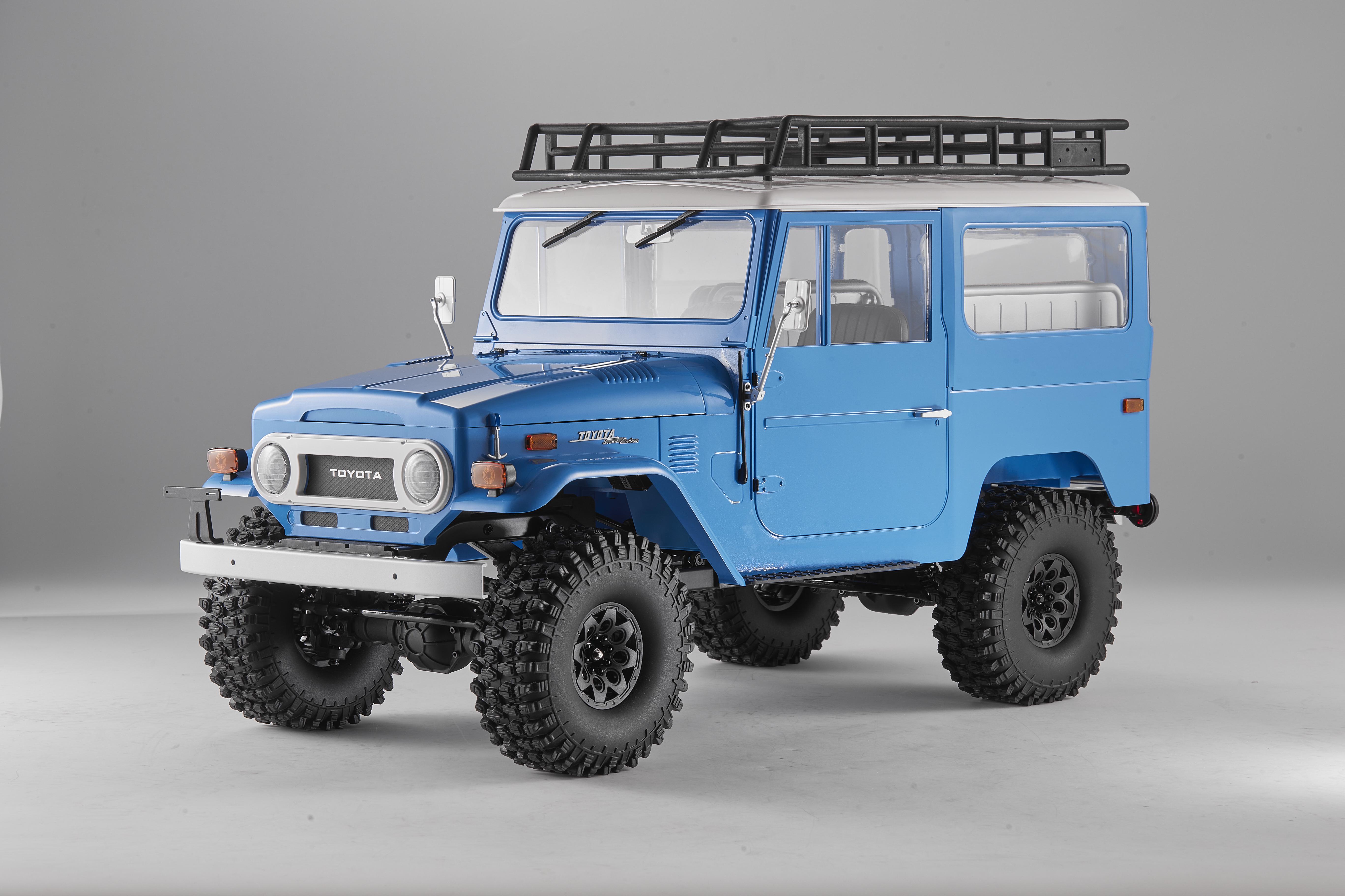 Машинка на радиоуправлении FMS 1:10 Toyota Land Cruiser FJ40 RS Blue - фото 7 Машинка на радиоуправлении FMS 1:10 Toyota Land Cruiser FJ40 RS Blue - фото 7