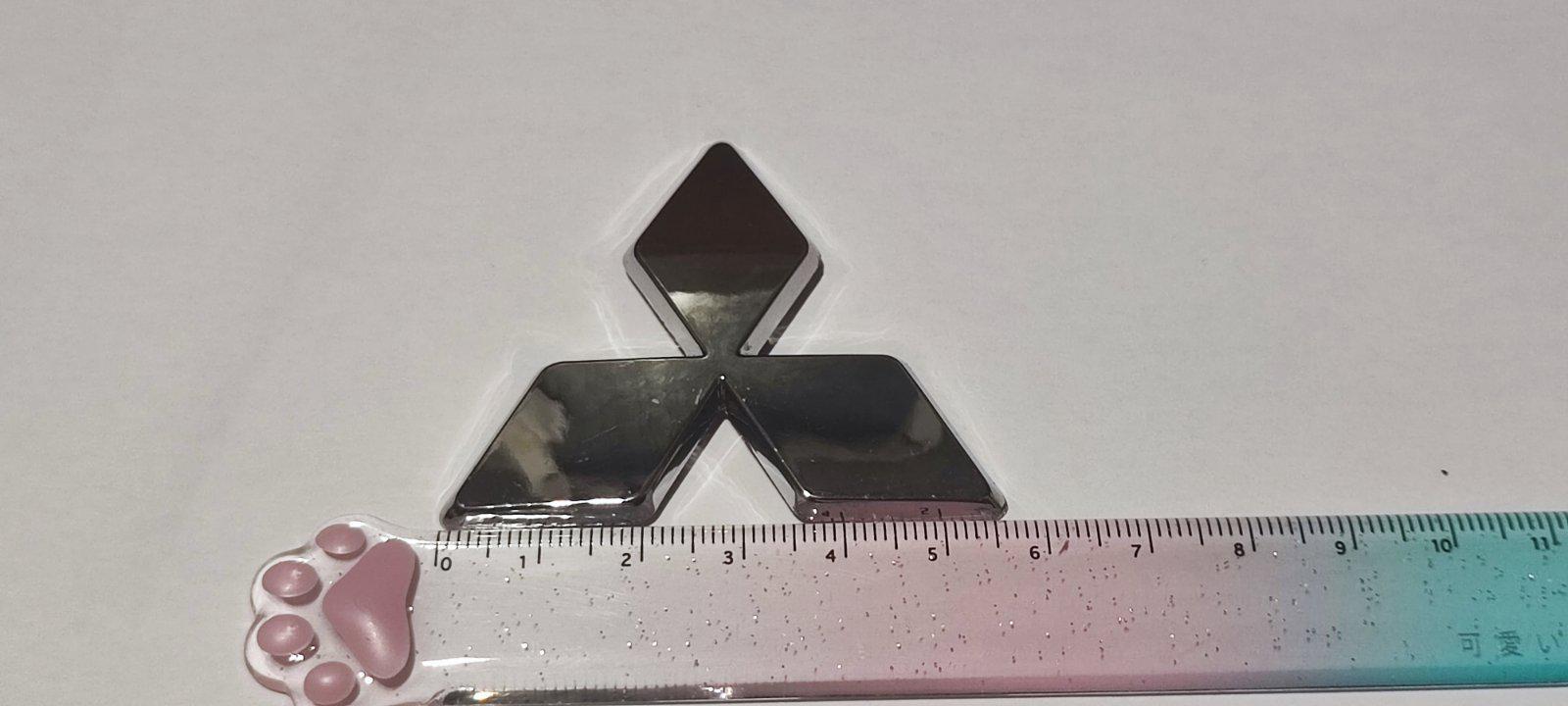 Логотип на кермо Mitsubishi Outlander XL/Lancer X Хром (27503978) - фото 3 Логотип на кермо Mitsubishi Outlander XL/Lancer X Хром (27503978) - фото 3