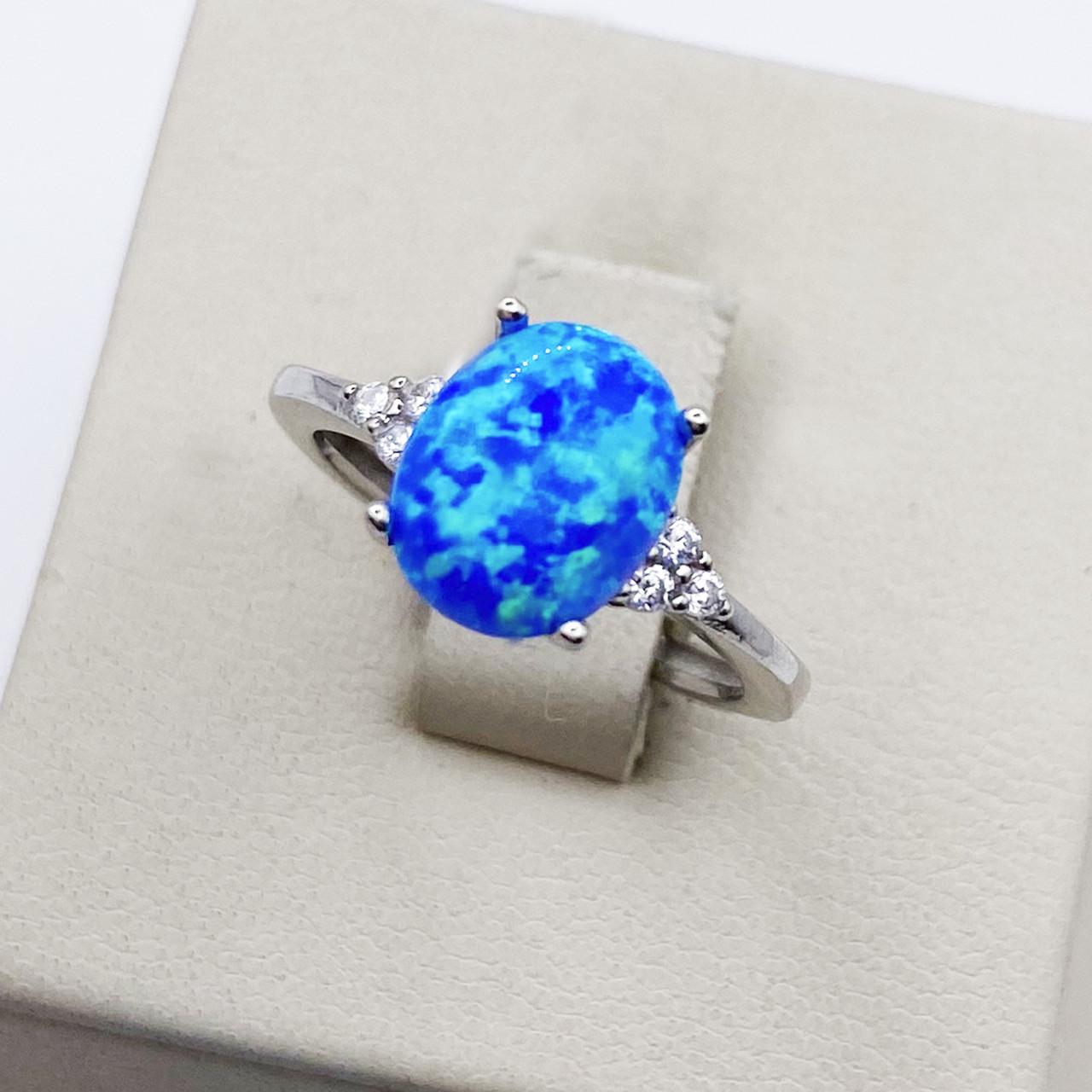 Кольцо серебряное с синим опалом р. 17 2,02 г (1899108581)