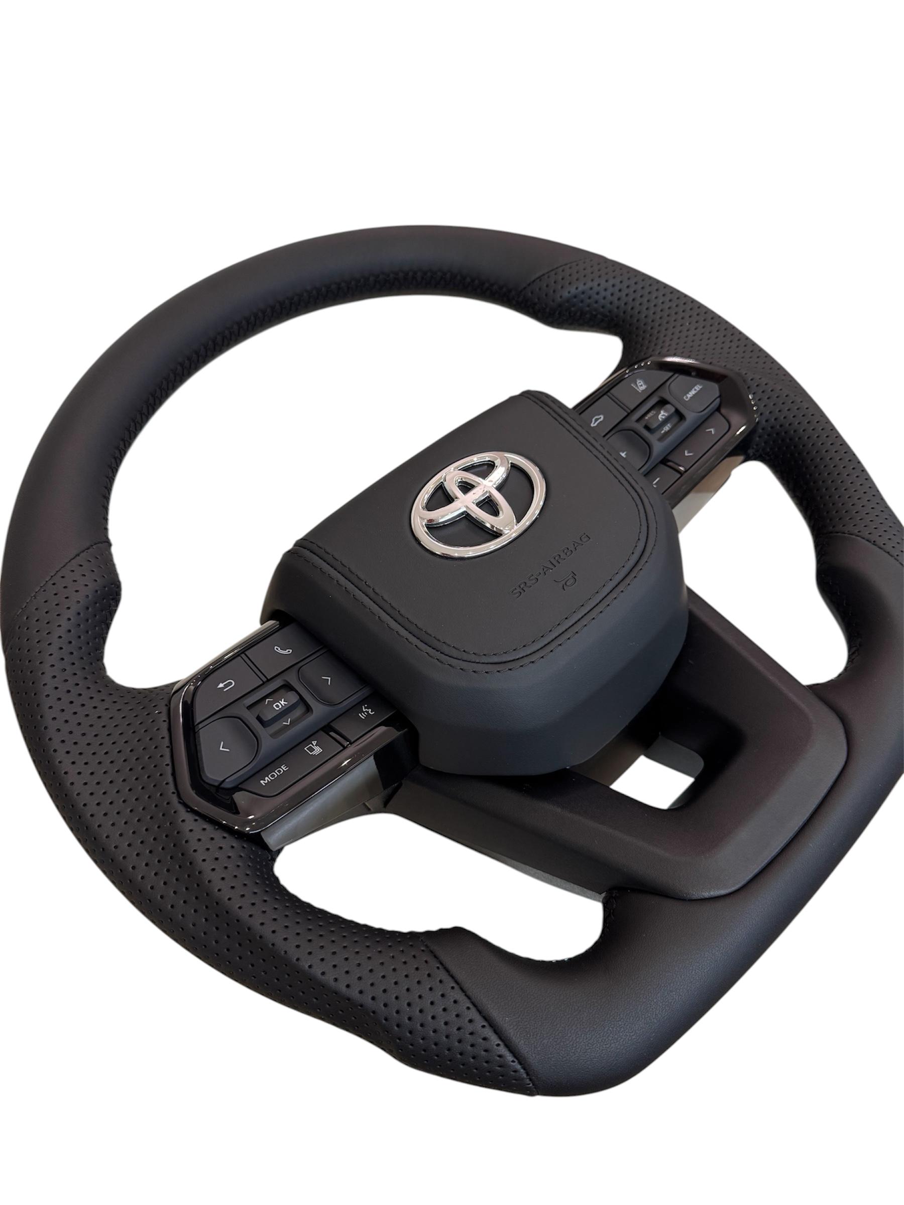 Руль для Toyota Land Cruiser 200/Prado 150 кожа со скошенным низом подушка из кожи хром (29452383) - фото 2 Руль для Toyota Land Cruiser 200/Prado 150 кожа со скошенным низом подушка из кожи хром (29452383) - фото 2