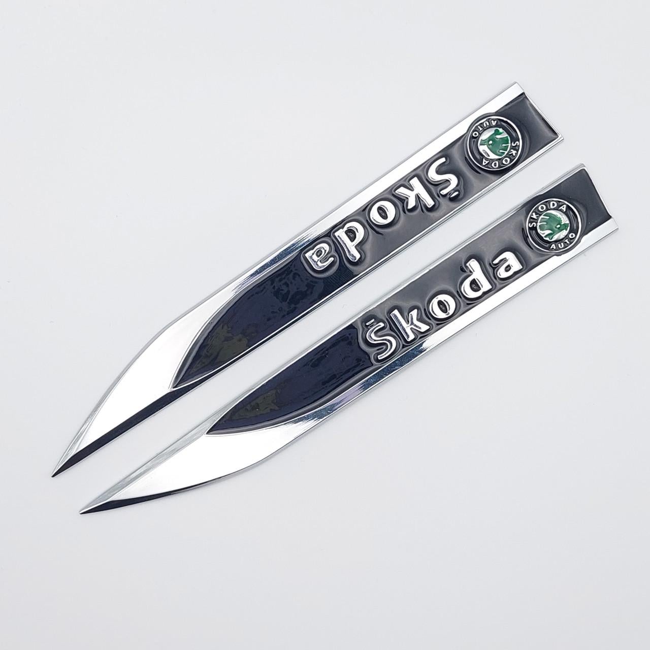 Эмблема на крылья Skoda старый 15х1,8 см Хром/Черный глянцевый (1672768028)