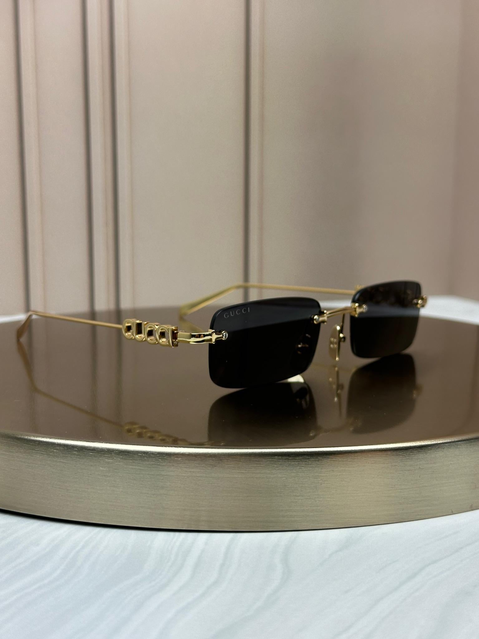 Солнцезащитные очки Gucci GG1808 безободочные Золотой