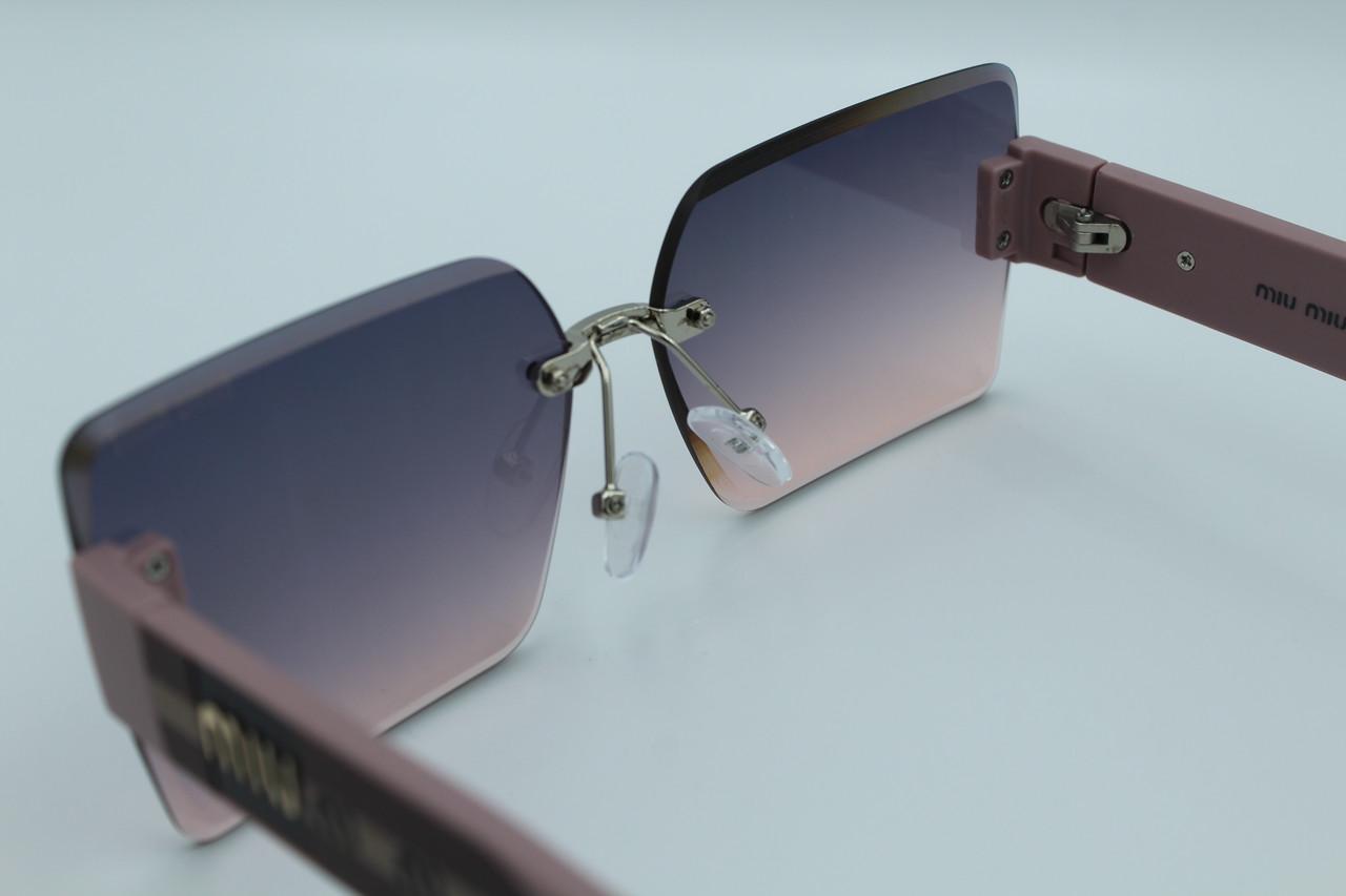 Сонцезахисні окуляри жіночі дизайнерські (58094 №3) - фото 7 Сонцезахисні окуляри жіночі дизайнерські (58094 №3) - фото 7