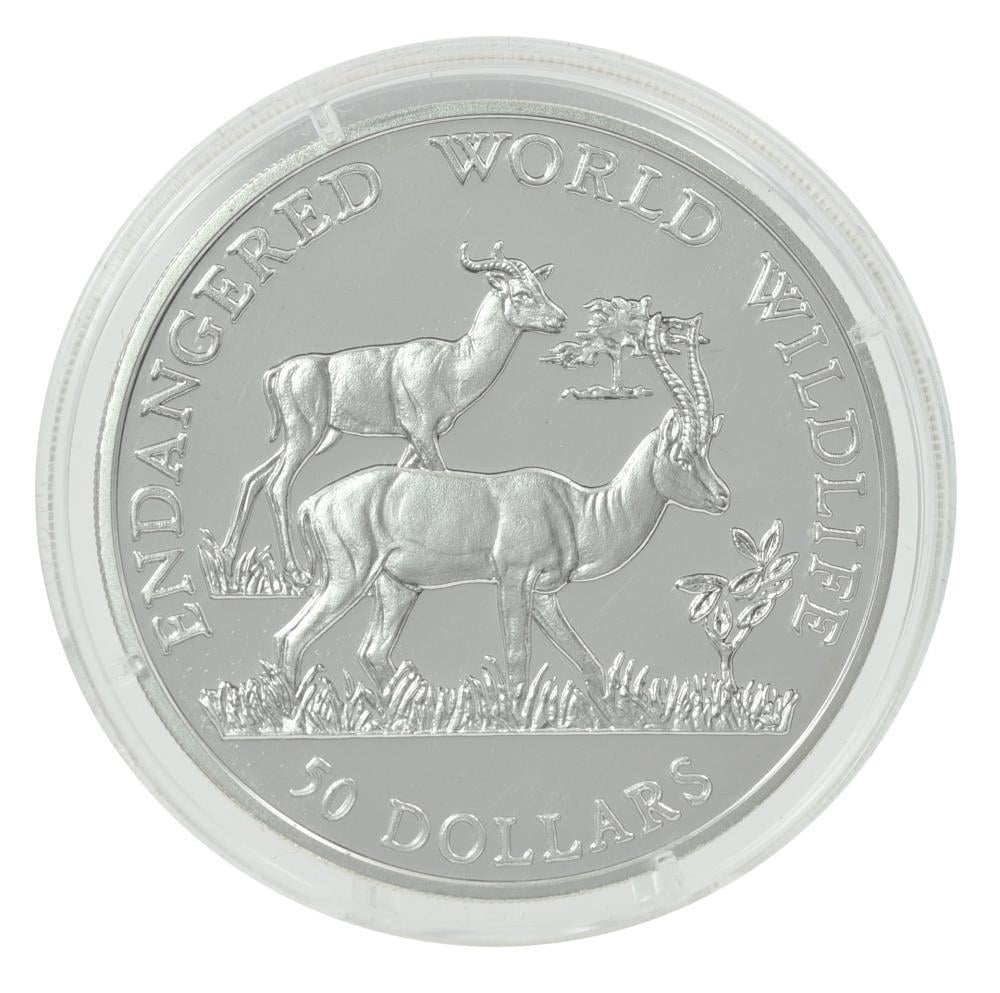 Коллекционная монета Острова Кука 50 долларов 1990 серебро Proof Исчезающие виды животных-Газель-дама (М21186)