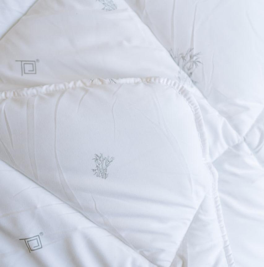 Одеяло летнее Бамбук двухспальное с эластичной мембраной 180х210 см - фото 6 Одеяло летнее Бамбук двухспальное с эластичной мембраной 180х210 см - фото 6