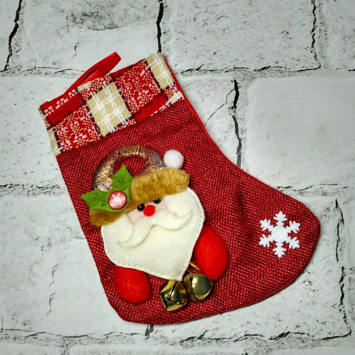 Сапожок декоративный новогодний рождественский с колокольчиками для подарков Санта 20х11 см Красный (N3-11-3) Сапожок декоративный новогодний рождественский с колокольчиками для подарков Санта 20х11 см Красный (N3-11-3)