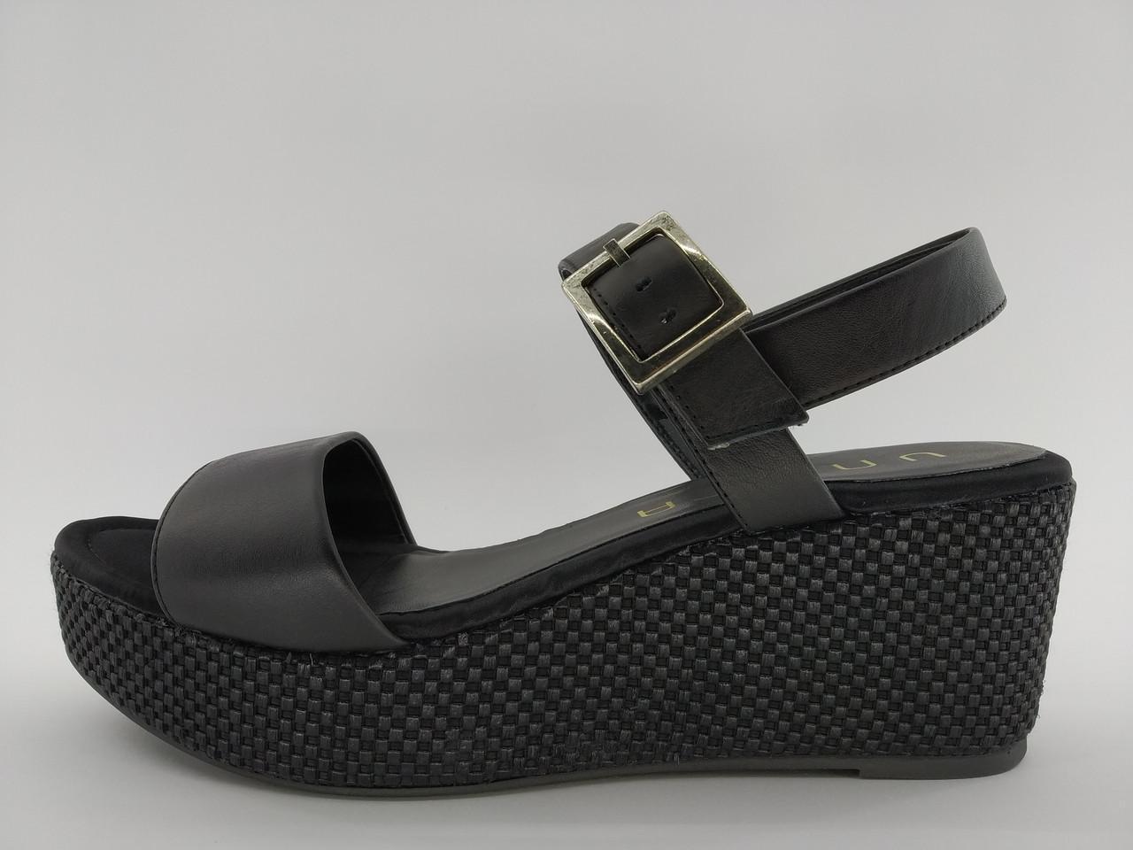 Босоніжки жіночі шкіряні на танкетці Unisa №039 р. 38/24,5 см Чорний (985167727) Босоніжки жіночі шкіряні на танкетці Unisa №039 р. 38/24,5 см Чорний (985167727)