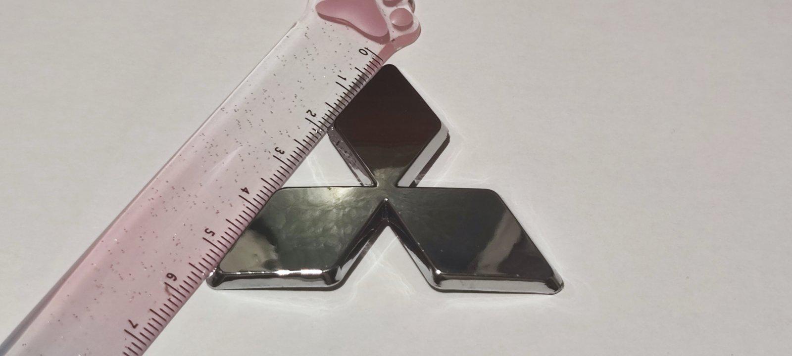 Логотип на кермо Mitsubishi Outlander XL/Lancer X Хром (27503978) - фото 4 Логотип на кермо Mitsubishi Outlander XL/Lancer X Хром (27503978) - фото 4