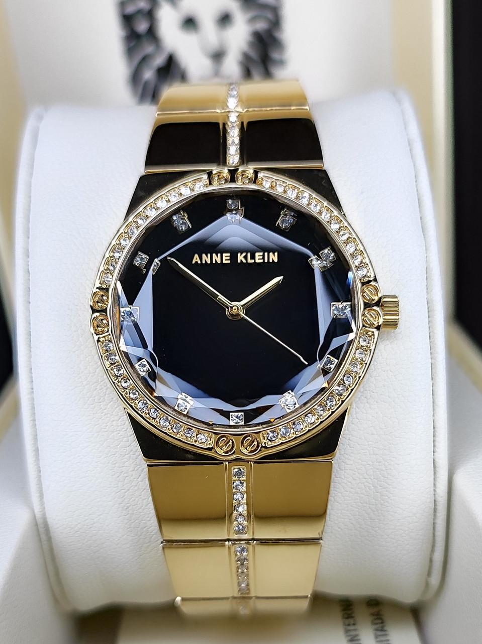 Наручные часы женские Anne Klein AK/5036BKGB с черным циферблатом и золотистым стальным браслетом