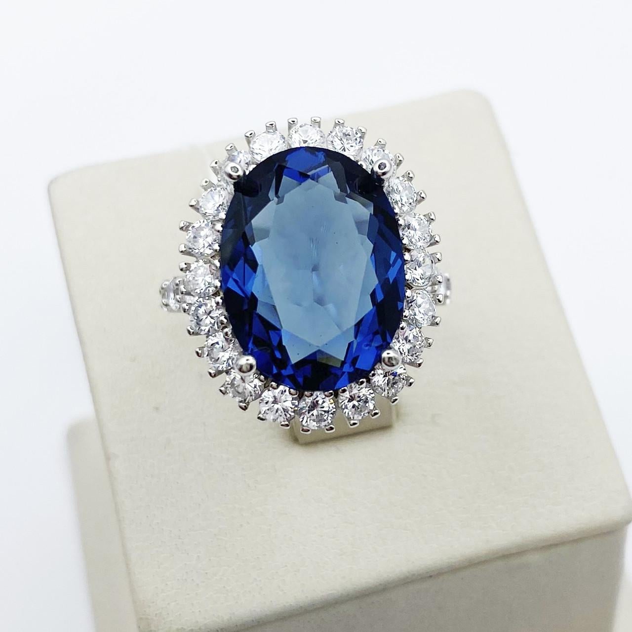 Кольцо серебряное с танзанитом и кубическим цирконием р. 17,5 6,64 г (1883381050)