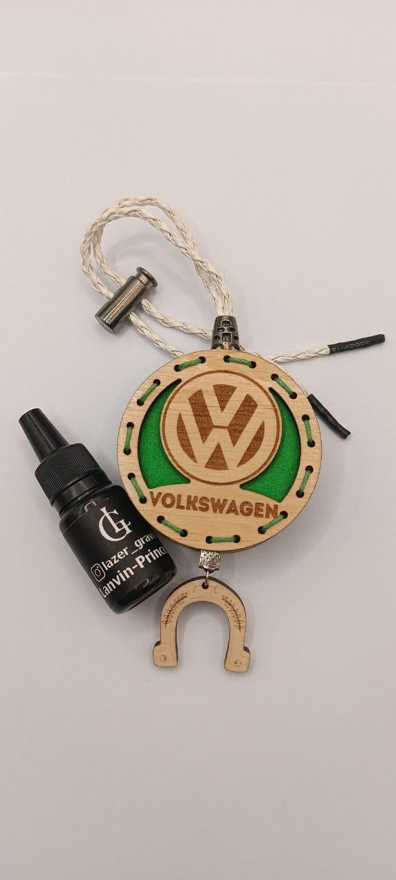 Ароматизатор для авто Volkswagen из дерева и войлока и аромапарфюм 10 мл (26630390) Ароматизатор для авто Volkswagen из дерева и войлока и аромапарфюм 10 мл (26630390)