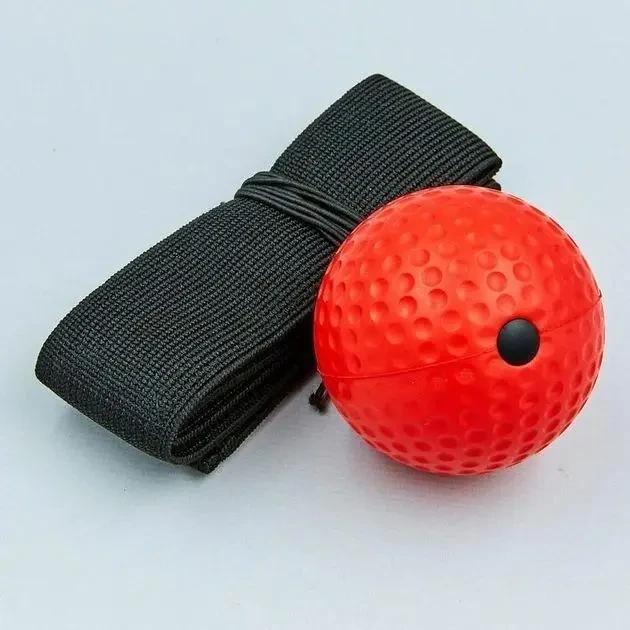 Тренажер для боксу з м'ячем на гумці (10049) Тренажер для боксу з м'ячем на гумці (10049)