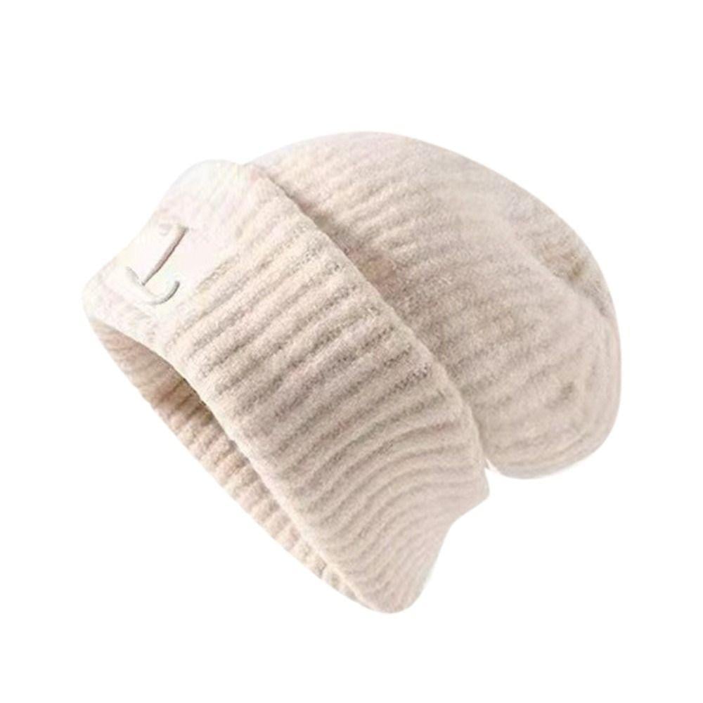 Шапка-біні в'язана Jago вовняна 54-60 см Молочний (4673911м) - фото 1 Шапка-біні в'язана Jago вовняна 54-60 см Молочний (4673911м) - фото 1