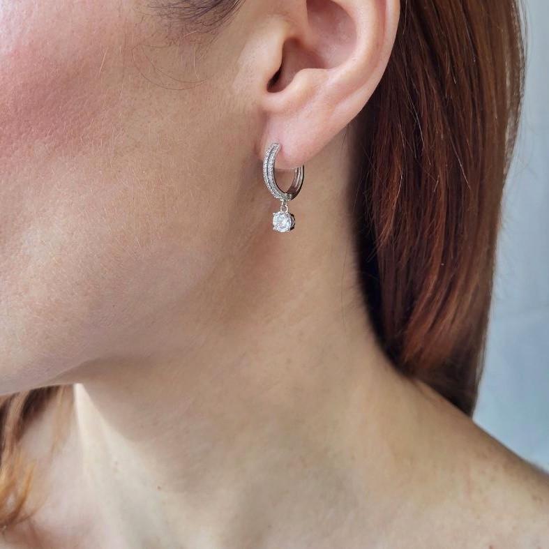 Сережки кільця 15 мм з підвіскою білий камінчик родоване срібло 925 проби 2,60 г (5075р) - фото 5 Сережки кільця 15 мм з підвіскою білий камінчик родоване срібло 925 проби 2,60 г (5075р) - фото 5