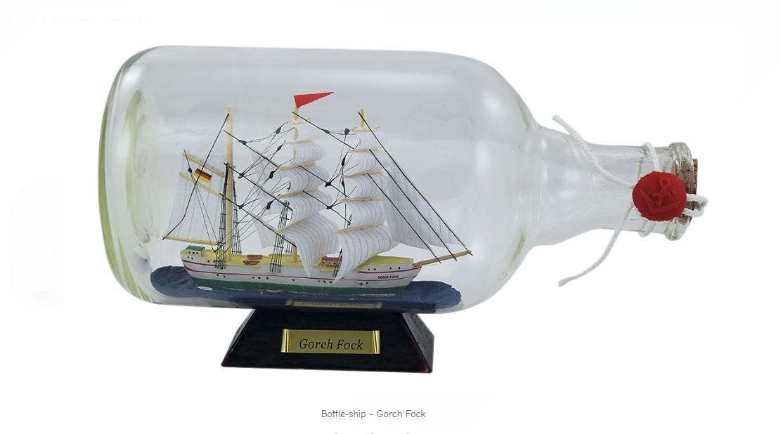 Модель парусника в бутылке Sea Club Gorch Fock h 15 см L 27,5 см d 12 см (4033.V)
