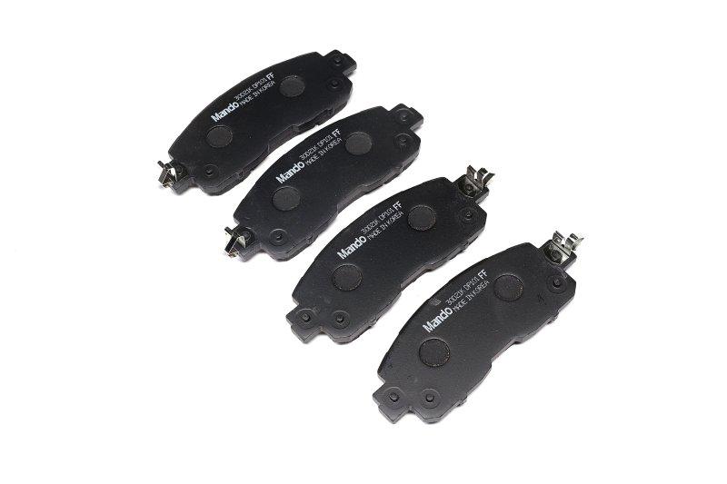 Колодки тормозные дисковые передние MANDO Nissan Leaf 10- (MPN18)