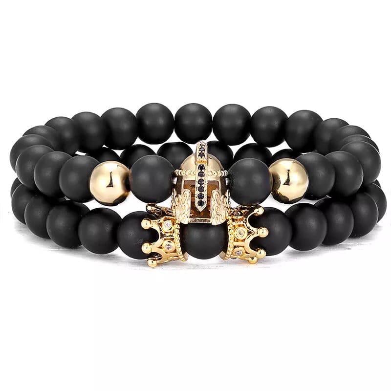 Комплект парних браслетів із шунгіту з коронами та золотим шоломом р. 21 (12100)