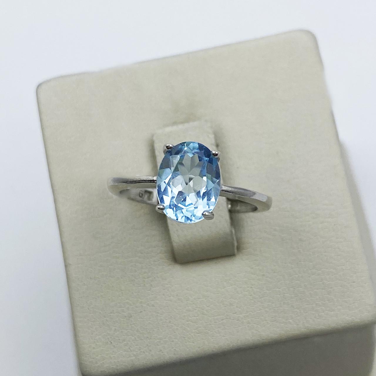 Кольцо серебряное с голубым топазом р. 17 2,27 г (1941909996)