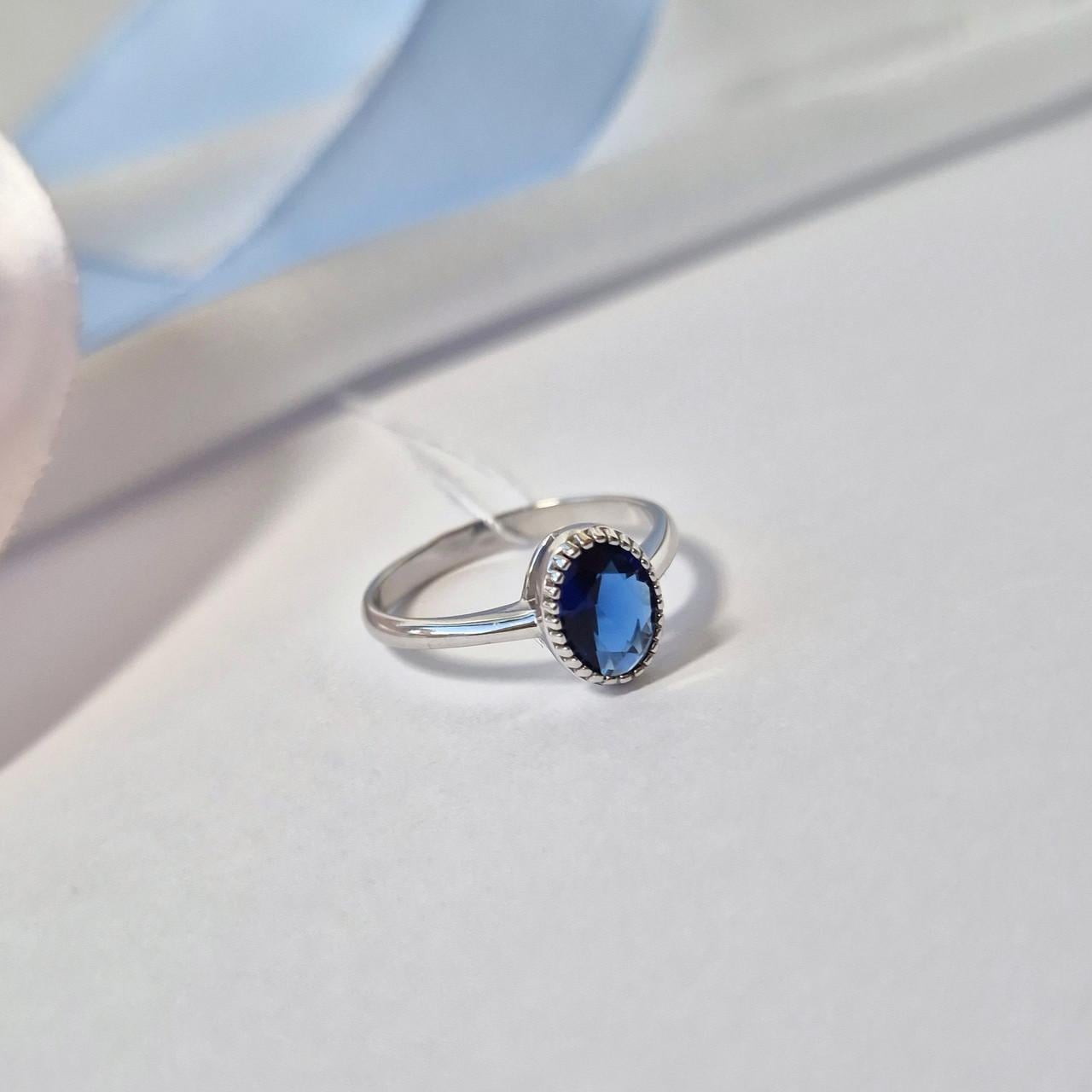 Кольцо с синим камнем р. 17,5 925 пробы 1,91 г (81107с) Кольцо с синим камнем р. 17,5 925 пробы 1,91 г (81107с)