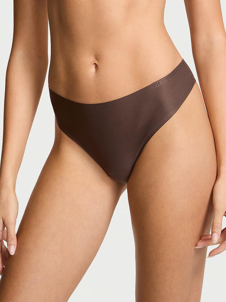 Трусики стринги Victoria's Secret Body by Victoria Flex Mid-Rise Thong Panty M Коричневый (27155551)
