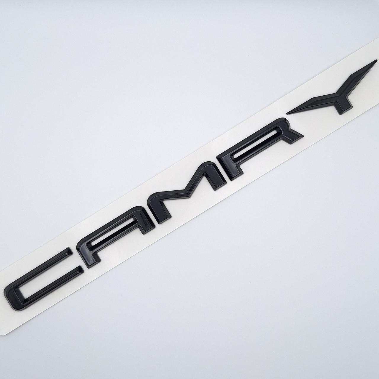 Эмблема надпись Camry Toyota ABS 26х1,5 см Черный глянцевый (2343760555)