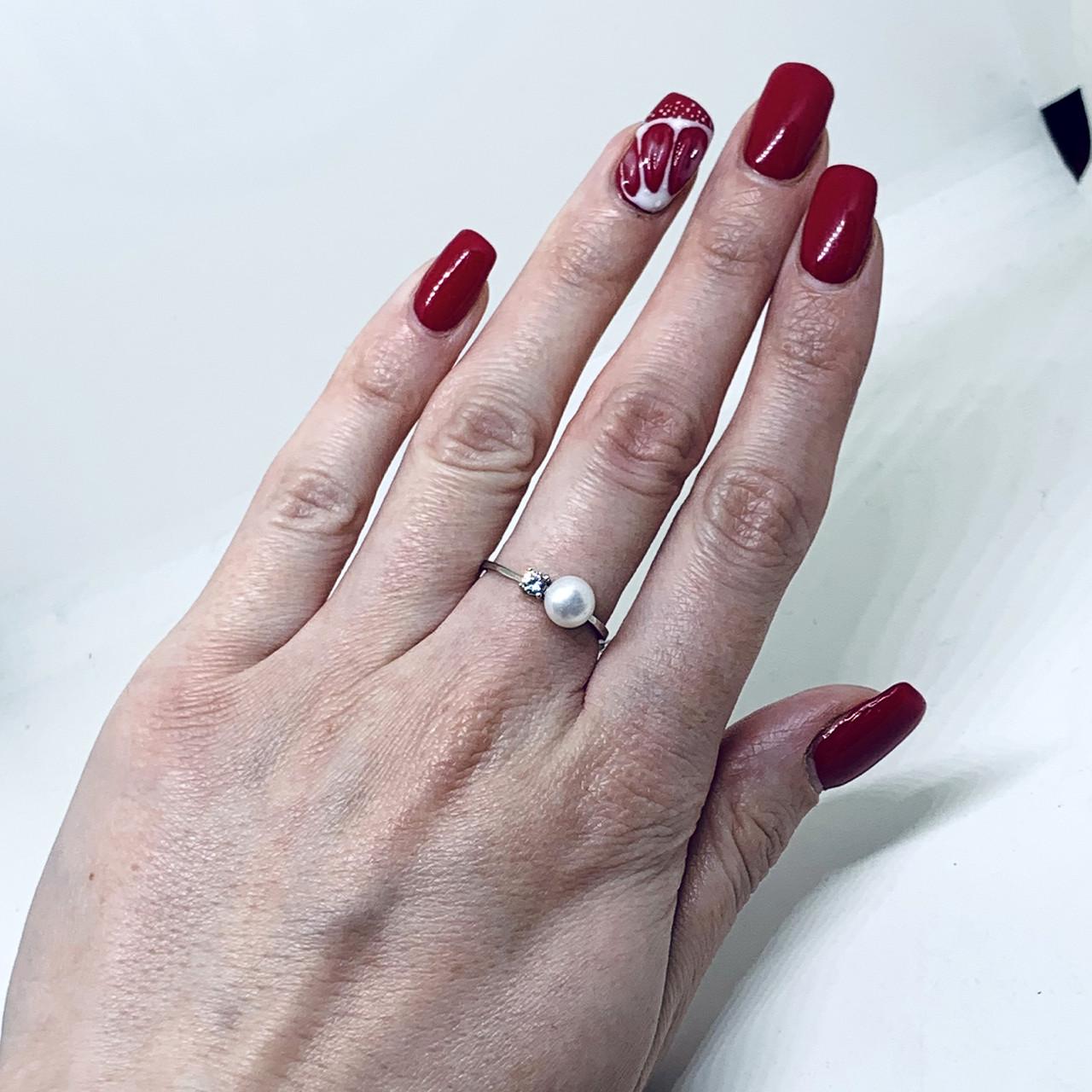 Кольцо серебряное с жемчугом и кубическим цирконием р. 19 1,5 г (1550668930)