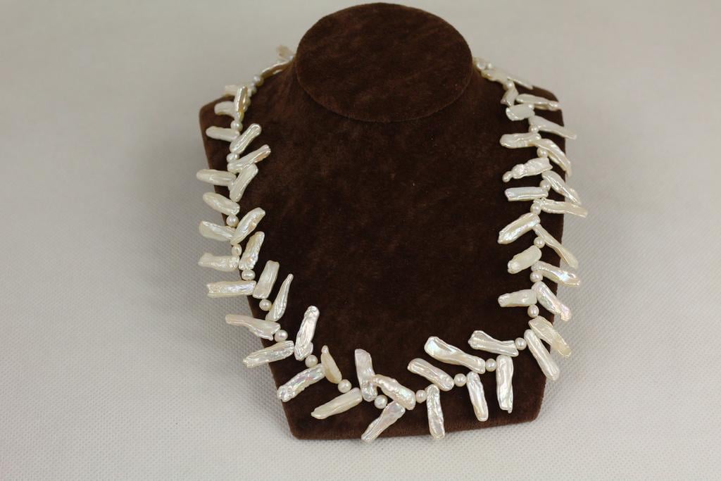 Ожерелье натуральные жемчужины речные круглые с барочными елочка 47 см Серебристый (31373270)