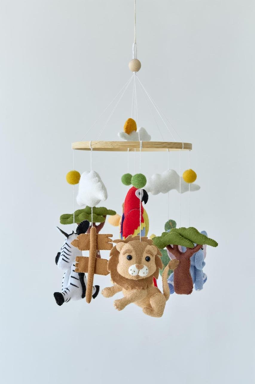Мобиль детский WoollyFox Теплые приключения: слон/жирафа/попугай/лев и зебра (27861125)