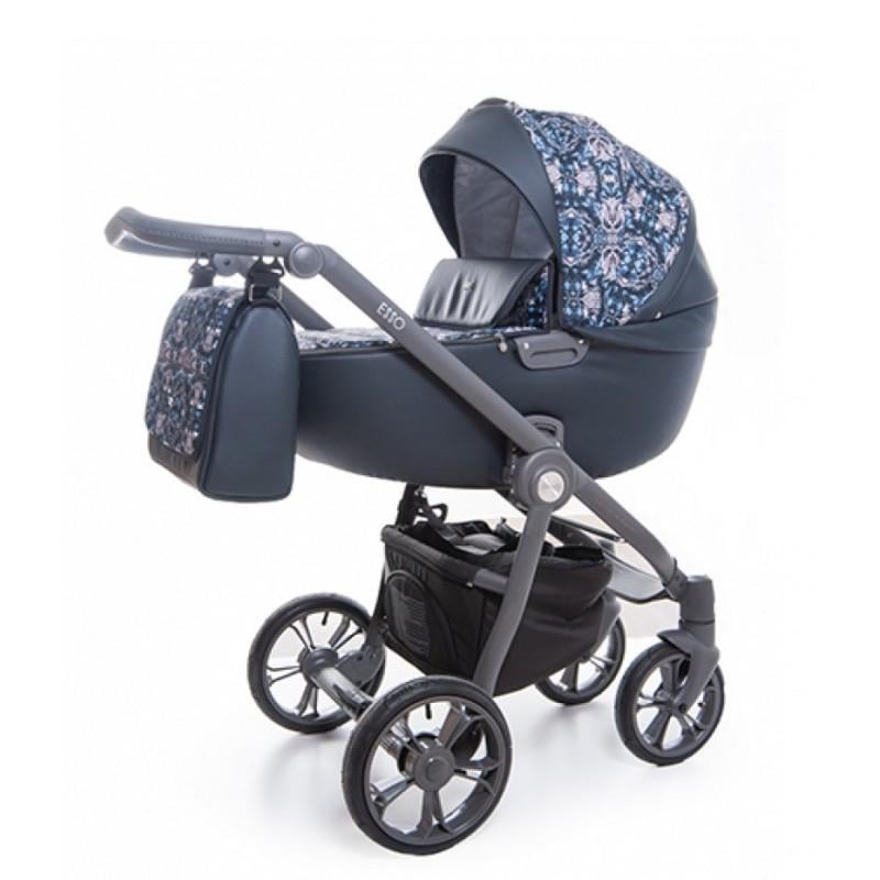 Коляска Roan Esso универсальная 2в1 с матрасом дождевиком и сумкой Blue sequins Коляска Roan Esso универсальная 2в1 с матрасом дождевиком и сумкой Blue sequins