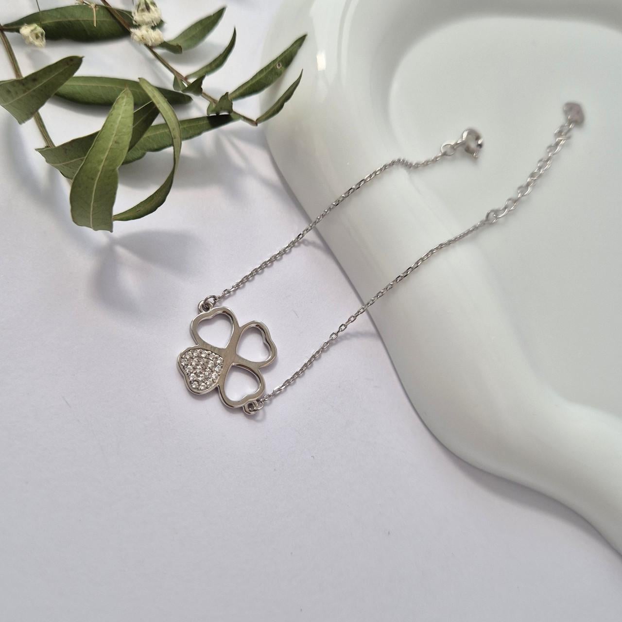 Браслет на руку конюшина з білими камнями срібло 925 проби родоване 2,32 г 16-19,5 см (лк0324р)