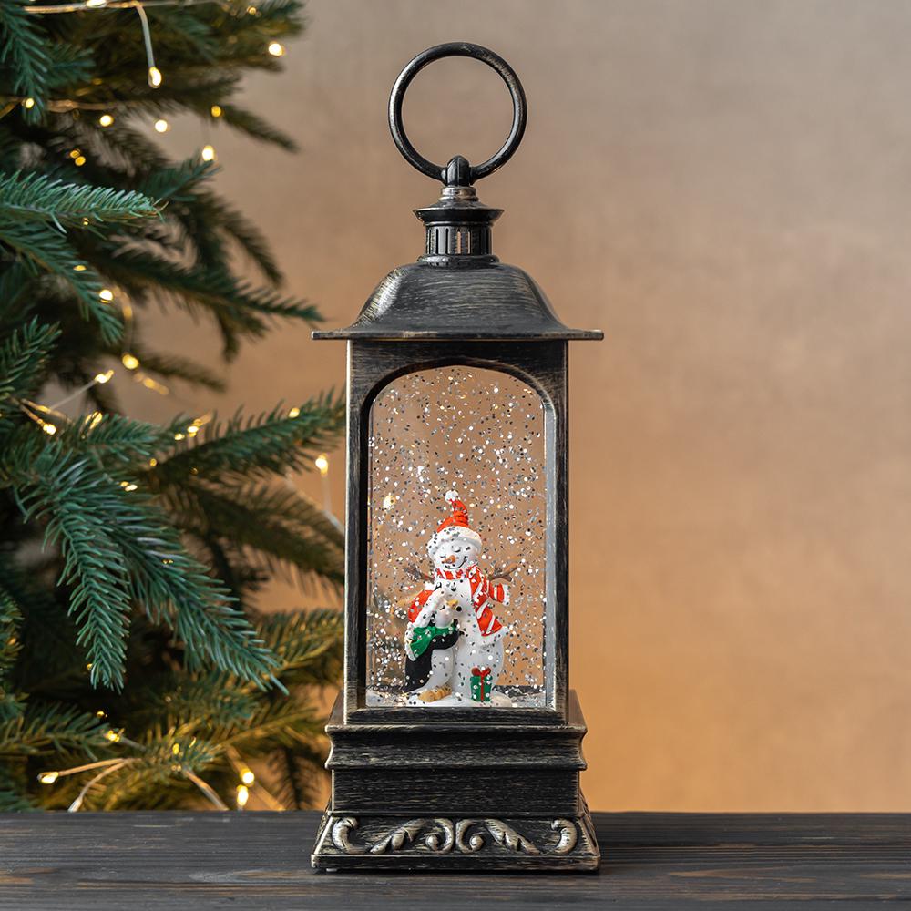 Новогодний фонарь с подсветкой и музыкой Снеговик с теплым сердцем 27 см (9240-021)