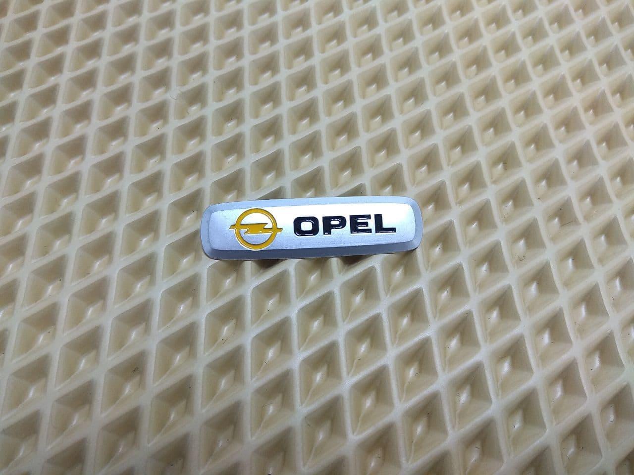Шильдик на автомобильный коврик EVA AVTM Opel LGEV10271 (1545402270)