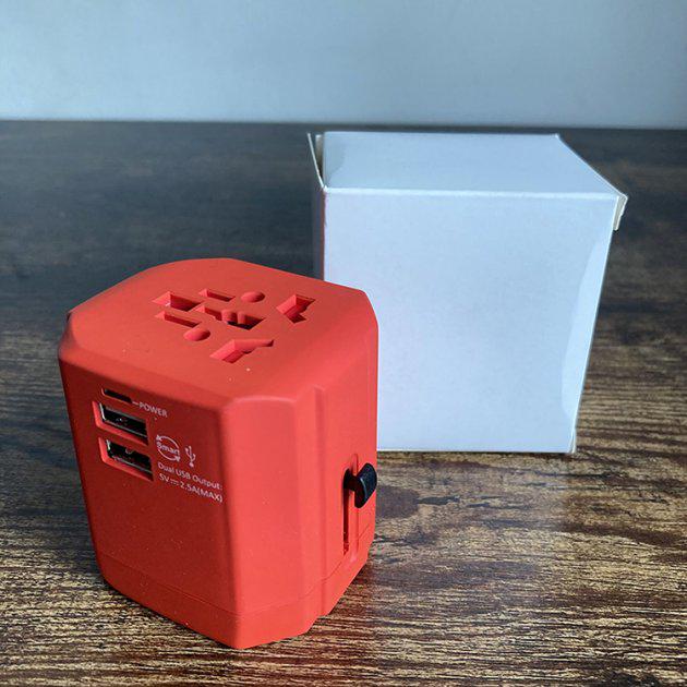 Універсальний адаптер для подорожей Yundon Travel Adapter + 2 USB Orange - фото 5