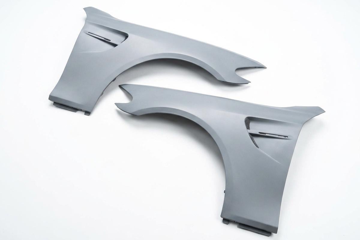 Передние крылья GBT в стиле М5 V2 для BMW 5 серия F10/F11 2010-2016 гг. под покраску 2 шт. (190396) Передние крылья GBT в стиле М5 V2 для BMW 5 серия F10/F11 2010-2016 гг. под покраску 2 шт. (190396)